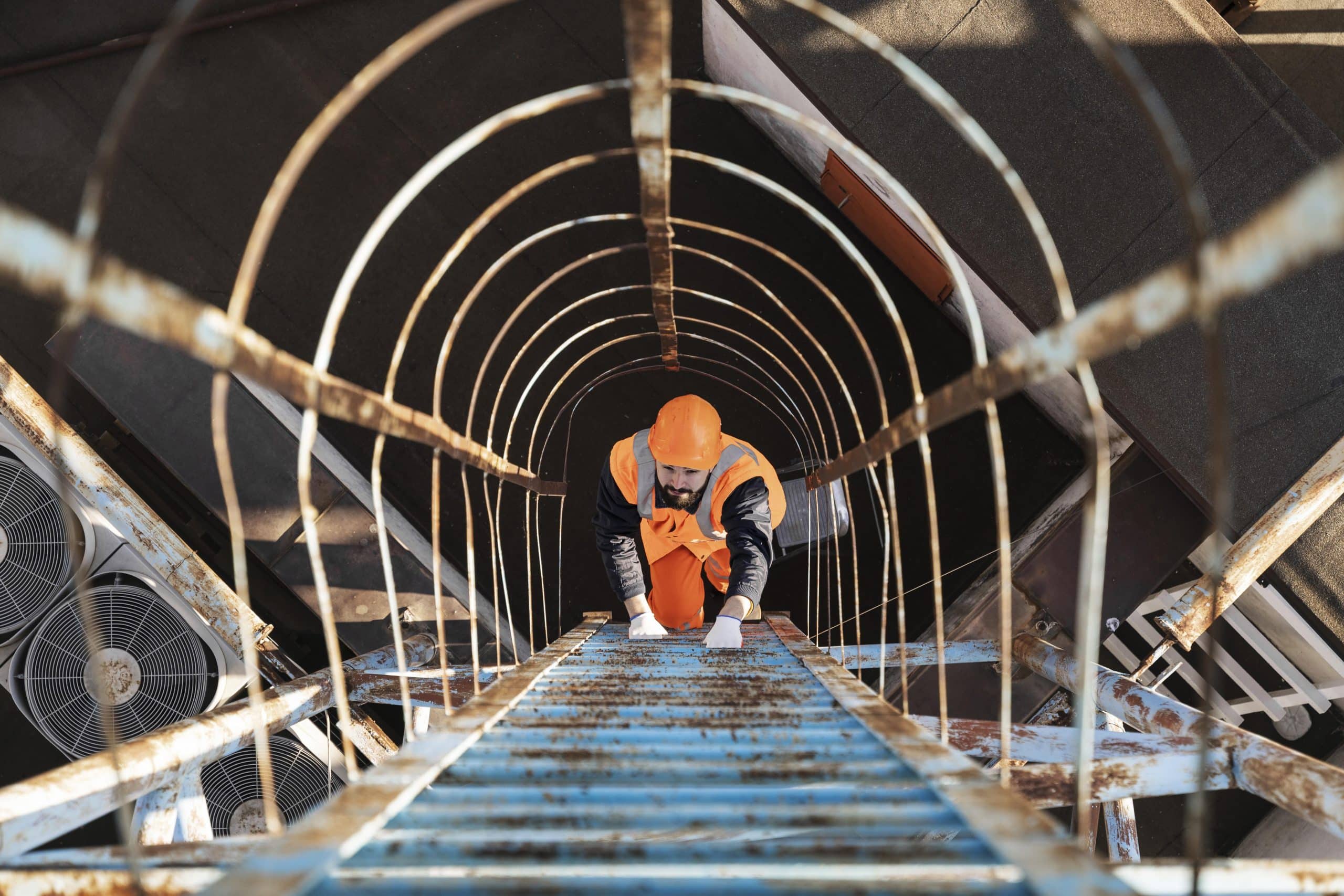a man climbing a ladder