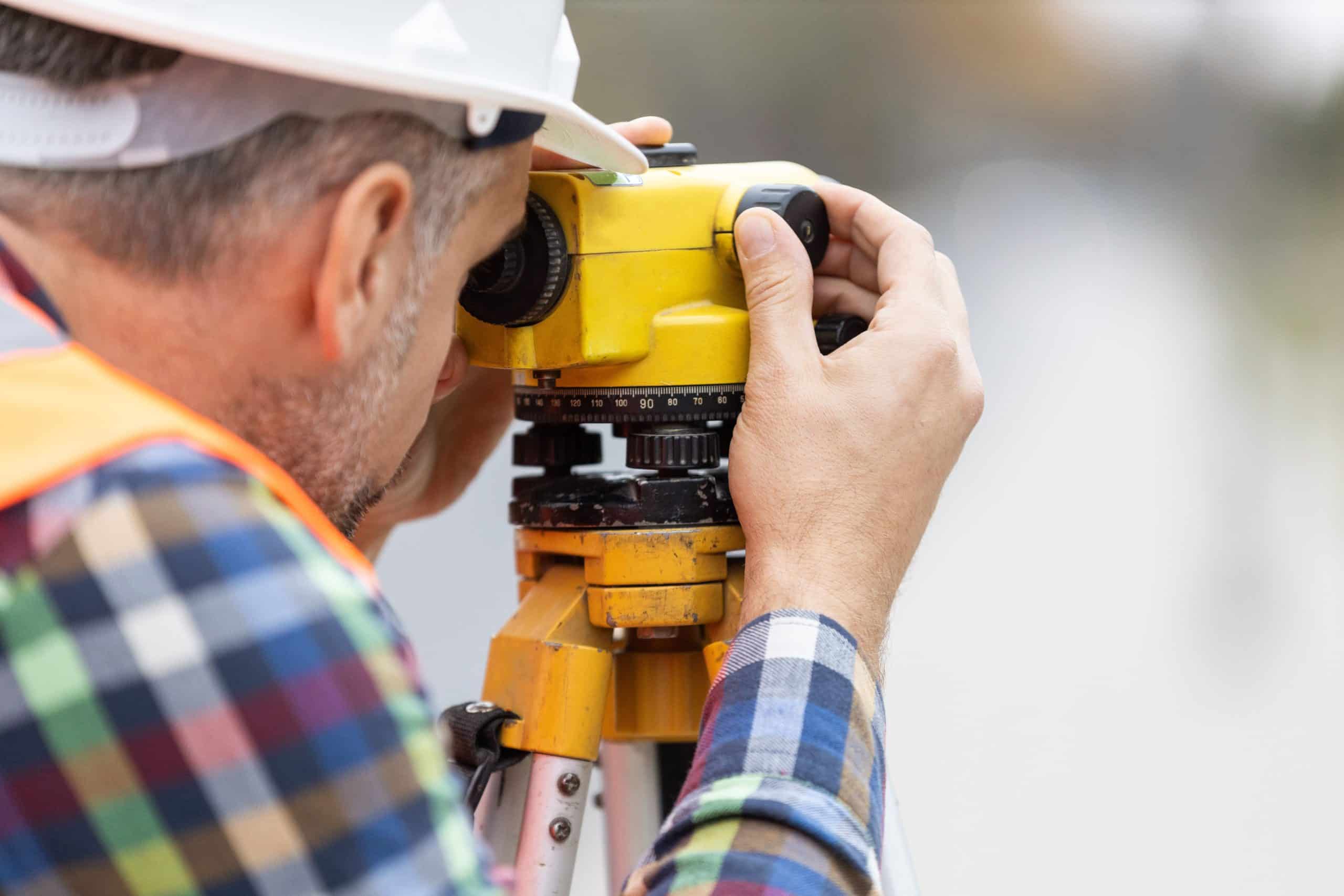 a man using a yellow object